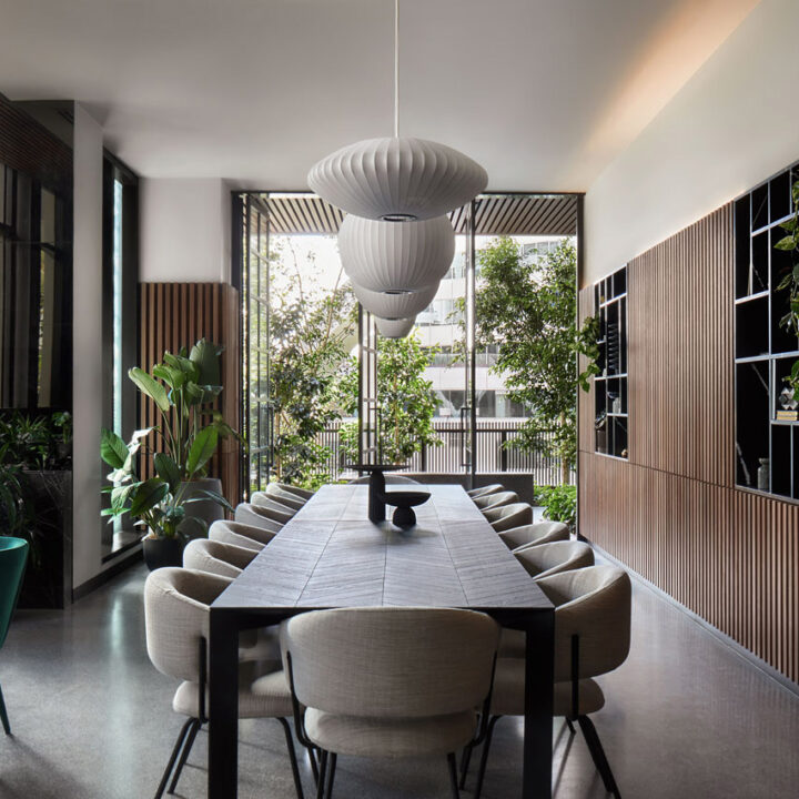Paragon interior dining room with chevron table and wood slats